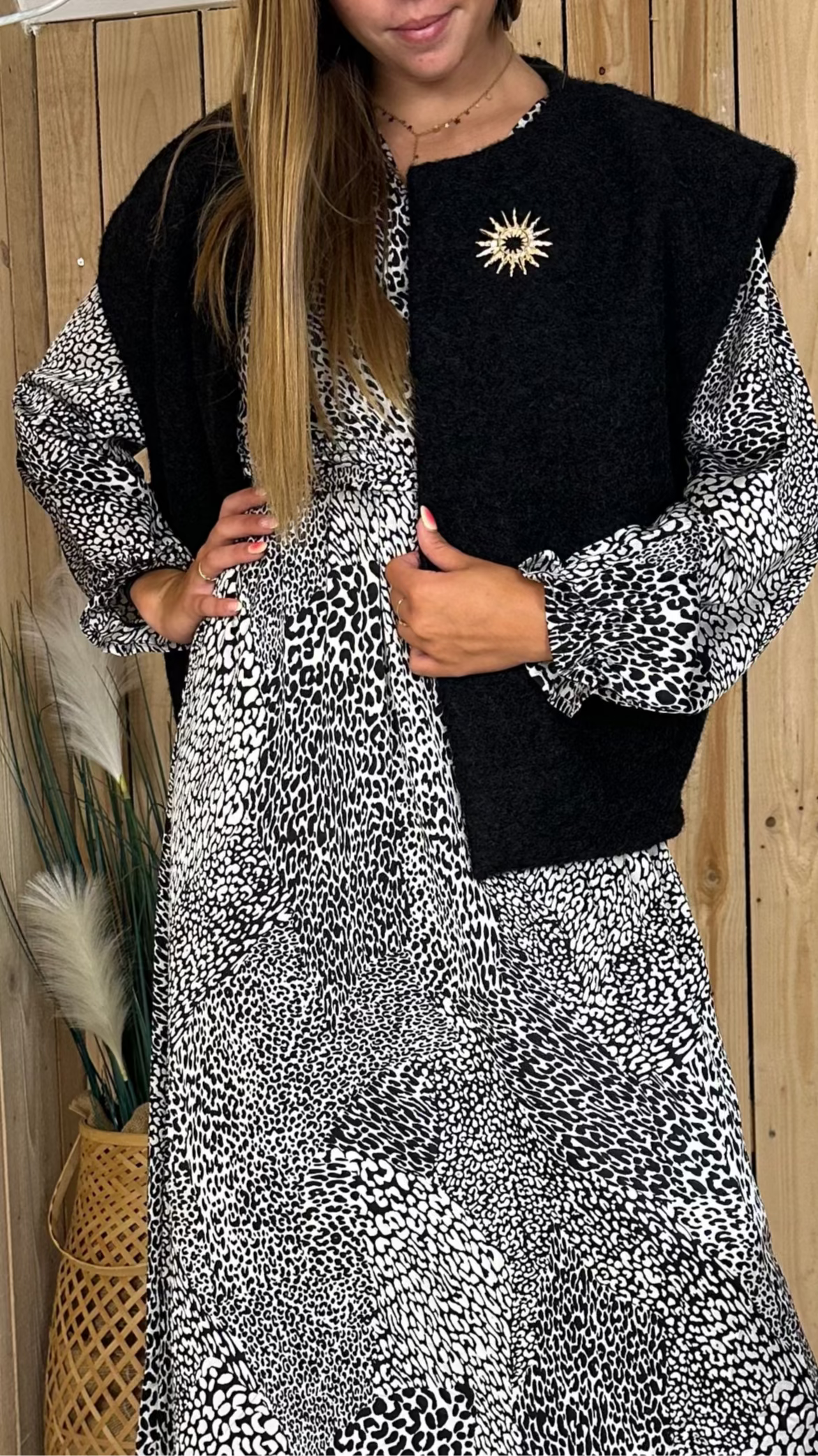 Gilet sans manche avec broche